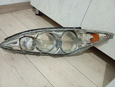 Передние фары: Передняя левая фара Toyota Оригинал — 9