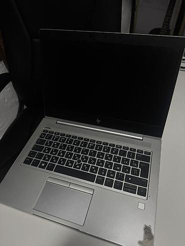 HP EliteBook — тонкий и лёгкий бизнес-ноутбук в серебристом