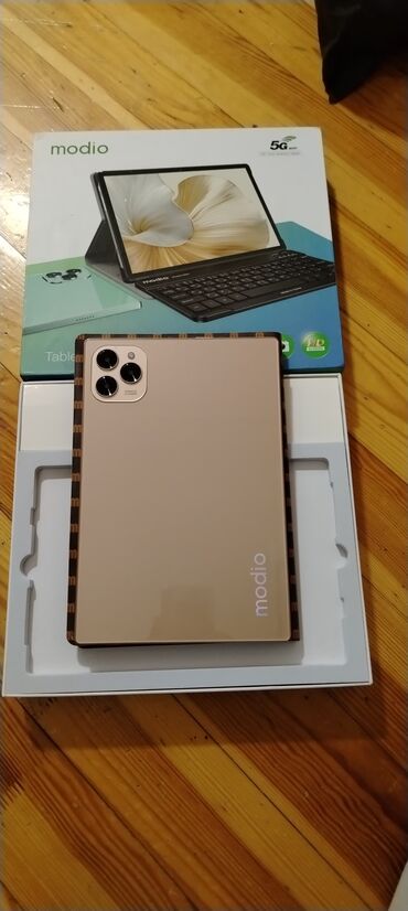 wifi modem adapter: Modio 38 Planset.Dual sim cart Yeni Kimidi 4 gün istifade olunub.Usaq