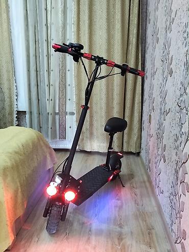 Электросамокаты: Elektrik skuter – oturacaqlı, güclü işıqlandırma və komfortlu sürüş — 1