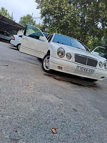 Mercedes-Benz: Mercedes-Benz E-Class: 2.3 l | 1996 il Sedan — 14