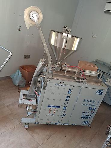 Paketləmə aparatları: XUANTENG XT-30 – Avtomatik maye qablaşdırma maşını - Model: XT-30 - — 5