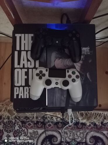 ucuz qulaqciqlar: PlayStation 4 (The Last of Us Part II limited edition örtüklü)