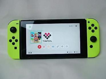 Nintendo Switch: Nintendo Switch, čipovana konzola u odličnom stanju. Čipovana — 16