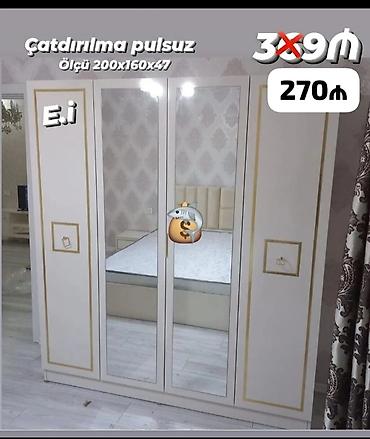 Dolablar: Ağ rəngdə, qızılı haşiyəli 4 qapılı şkaf. Ortada 2 tamhündür güzgülü — 1