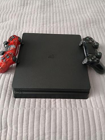 PlayStation 4 Slim (черная) Комплектация: - Консоль PS4 Slim - 2
