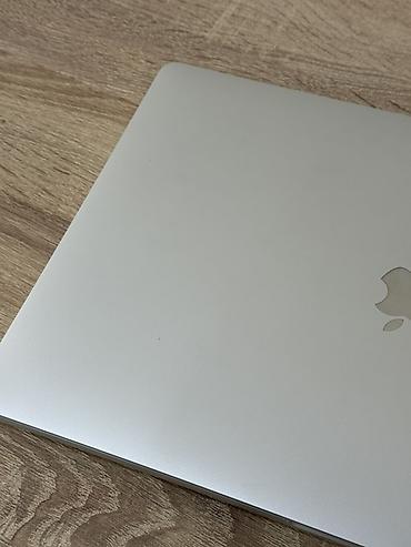 Ноутбуки Apple (MacBook): Apple MacBook Pro 16" (серебристый) - Экран 16 дюймов Retina, тонкие — 3