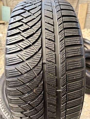 Шины: Комплект зимних шин Kumho (шипов нет) 235/45 R19 99V XL, M+S — 2