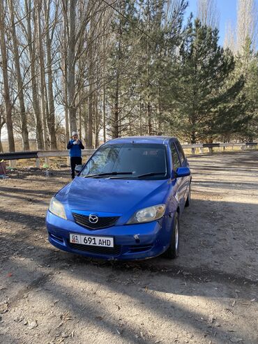 Mazda: Mazda Demio: 2003 г., 1.3 л, Автомат, Бензин, Седан