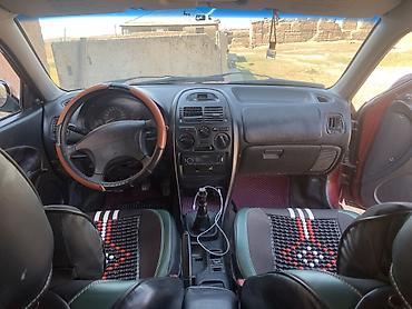 буу донголок chevrolet malibu шина: Mitsubishi Carisma: 1998 г., Седан — 8