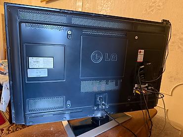 купить тв бу: Televizor LG 107 ekran krosnu aparatı antenası və altındakı şkafla — 4