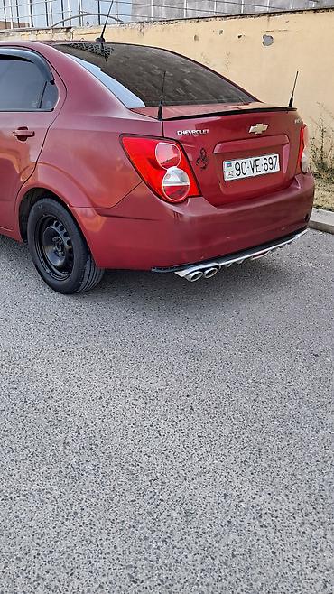 mercedes 208 d: Chevrolet Aveo sedan – qırmızı rəng, 4 qapı. Texniki və komfort — 5