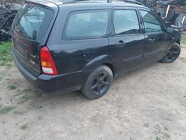 tepih crni: 1.8 16V DELOVI ZA FORD FOCUS OD 1998. DO 2001. GOD. | Fokus 1.8 — 3