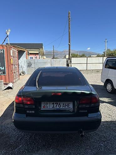 обмен на купе: Mazda 626: 1997 г., 1.8 л, Механика, Бензин, Седан — 3