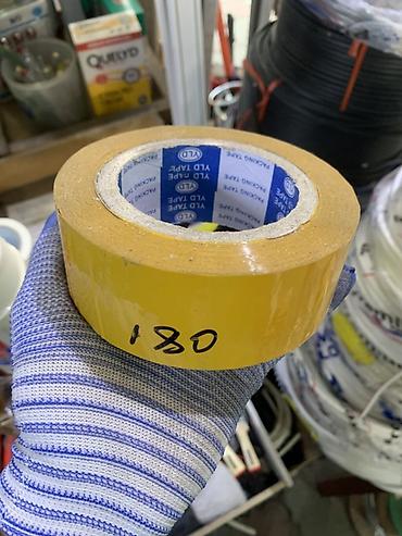 Скотч упаковочный VLD Packing Tape, прозрачный (жёлтый оттенок) -