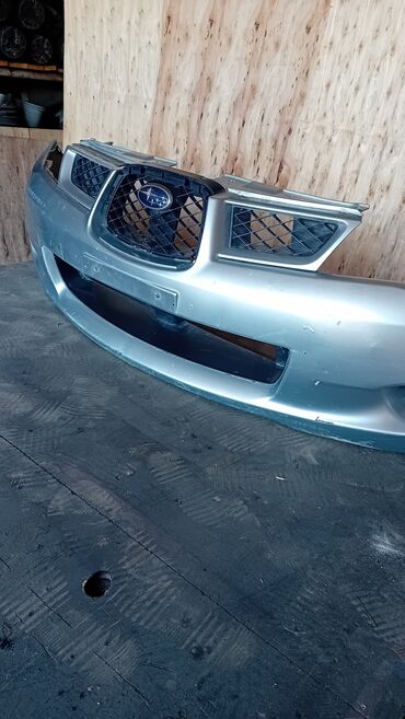 Другие автозапчасти: Передний бампер Subaru Impreza 2005, серебристый Продаю оригинальный at lalafo.kg Другие автозапчасти: Передний бампер Subaru Impreza 2005, серебристый Продаю оригинальный