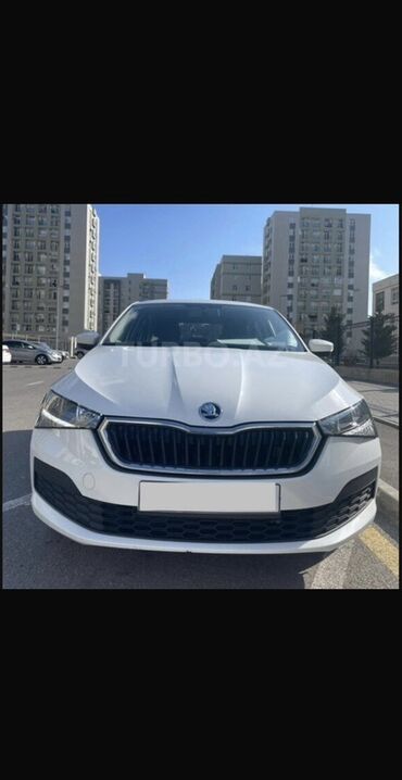 турбо.аз все об автомобилях в азербайджане: Skoda Rapid – ağ rəngli, şəhər və tras üçün universal sedan. Texniki