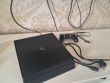 плейстейшен 4про: Игровая консоль Sony PlayStation 4 Pro в черном цвете. В комплекте с