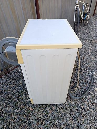 600: Стиральная машина LG WD-80130NU (фронтальная загрузка) - Загрузка: 5 — 8