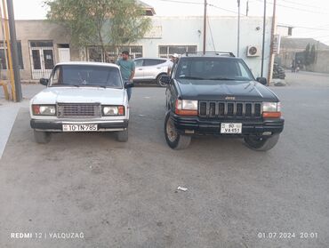 belarus 1221 2: Jeep Grand Cherokee: 5.2 л | 1997 г. Седан