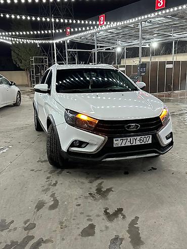 corolla cros: Lada Vesta SW Cross – ağ rəngli, şəhər və ailə istifadəsi üçün praktik — 8
