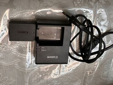 ən ucuz planşetlər: Canon 1100 vә daha üstün modellәr ücün adapter vә batareyası tәzә