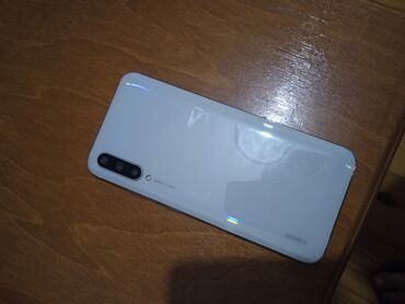 xiaomi mi 8 lite qiymeti kontakt home: Xiaomi Mi A3, 64 ГБ, цвет - Белый, 
 Отпечаток пальца, Две SIM карты
