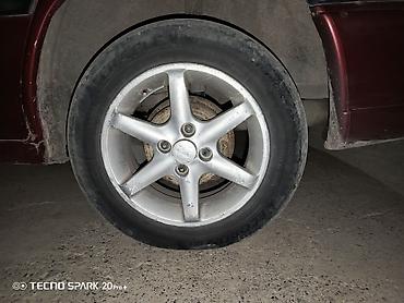 Дөңгөлөктөр монтажда: Дөңгөлөктөр монтажда 175 / 65 / R 14, Кыш, Колдонулган, Комплект, Жеңил унаалар, Куйма, тешиктери - 4 — 5