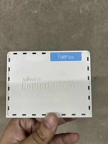 switch 2: MikroTik hAP lite (RB941-2nD) Wi‑Fi routeri - Ev və kiçik ofislər — 2
