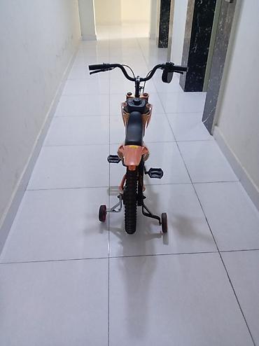 Velosipedlər: Uşaq velosipedi – idman motosikleti üslubunda, portağal rəngli — 2