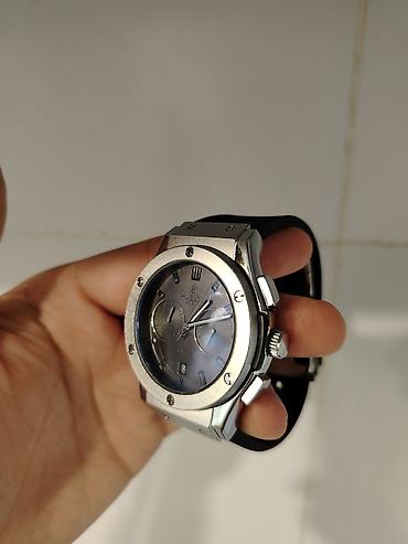 pol sapaski: Hublot kişi qol saatı - Korpus: paslanmayan polad, səkiz vintli bezel — 2
