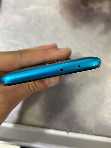 still cool android: Redmi smartfon – mavi rəng Xüsusiyyətlər: - Arxa tərəfdə AI Quad — 3