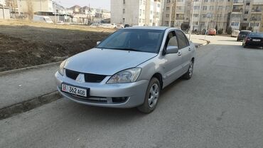 Mitsubishi: Mitsubishi Canter: 2005 г., 1.6 л, Механика, Бензин, Седан