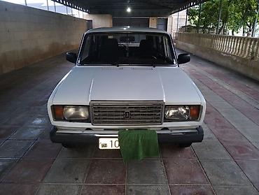 nomre qablari: Lada 2104, ağ rəngli universal kuzov Texniki xüsusiyyətlər: - Kuzov — 2