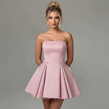 Kratka elegantna haljina bez bretela
2400din
S M L