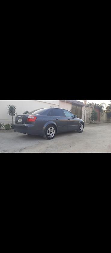 bmw e 38: Audi A4 sedan – tünd boz rəng, 4 qapı, 5 yerlik. B6 kuzov dizaynı — 3