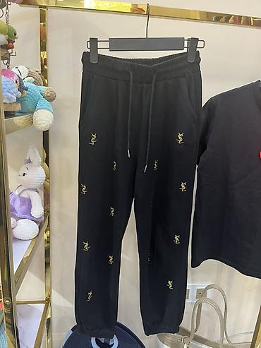 Брюки: Qara rəngli idman şalvarı - Model: Jogger kəsim - Material: Yumşaq — 1