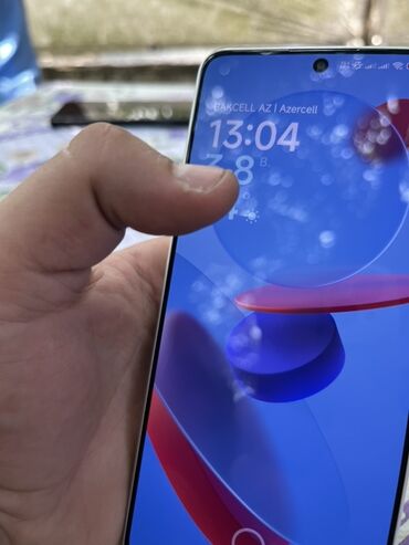 soyuducular 2ci əl: Poco X6 pro 5G boz rəngli smartfon nazik dizayna və metal çərçivəyə