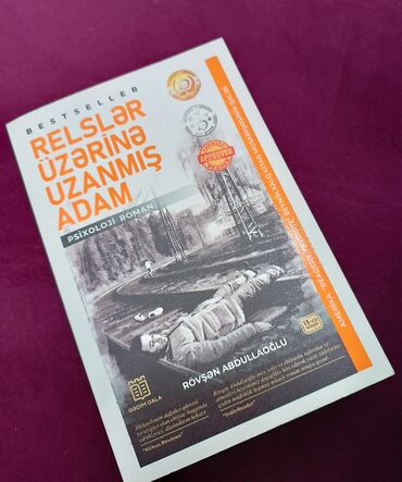 Bədii ədəbiyyat: Rövşən Abdullaoğlunun "Relslər üzərinə uzanmış adam" psixoloji romanı