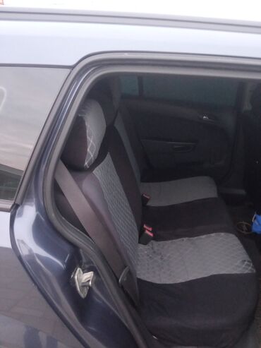 Opel: Opel Astra H – 5 qapılı hetçbek Xüsusiyyətlər: - Kuzov: tünd göy — 11