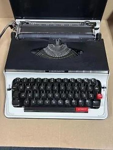 Stari uređaji: Hermes 550 – prenosna mehanička pisaća mašina - Model: Hermes 550 — 8