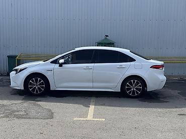 Toyota: Toyota Corolla: 2023 г., 1.8 л, Вариатор, Гибрид, Седан — 5