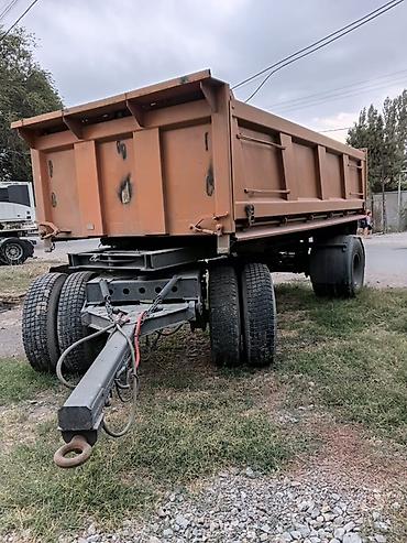 юмз донголок: КамАЗ 15 000$ 
Прицеп 850 000 сом — 7