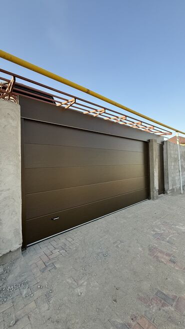 Секционные ворота: – Жогору көтөрүлөт — орун үнөмдөлөт – Кооз жана бекем көрүнүш — — 10