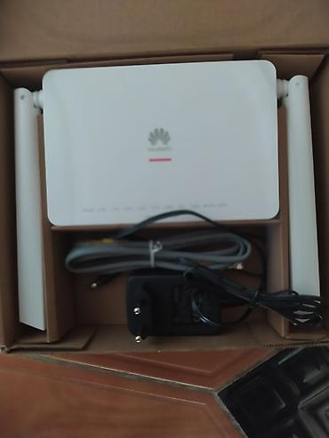 modem adaptoru: Huawei simli/simsiz şəbəkə yönləndiricisi (router) Xüsusiyyətlər: - — 1