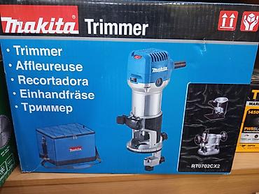 Фрезер Makita RT0702CX2 с набором насадок и принадлежностей для