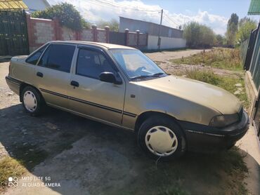 тюнинг матиз: Daewoo Nexia, седан, золотистый металлик. Кузов: - 4 двери, окраска