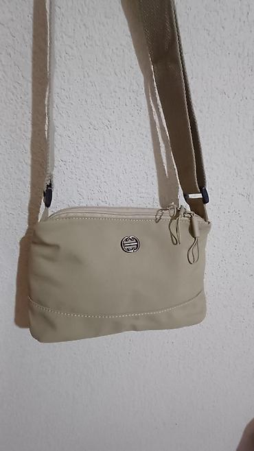 Классические сумки: Продаётся женская сумочка с длинным ремнём,материал плащёвка мягкая at lalafo.kg — 11 Классические сумки: Продаётся женская сумочка с длинным ремнём,материал плащёвка мягкая — 11