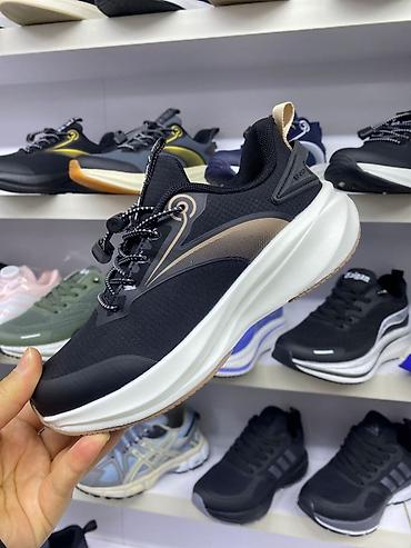 Детская обувь: Кроссовки и кеды — широкий выбор моделей на полках магазина. - — 14