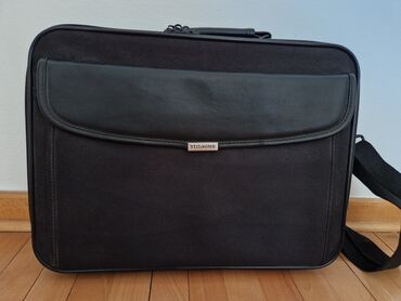 Računari, laptopovi i tableti: Toshiba laptop torba Nekorištena Toshiba torba za laptop. Spoljašnji